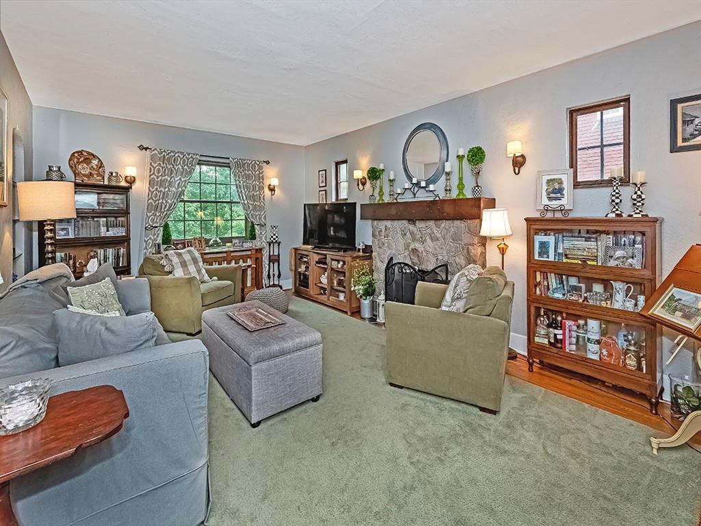 644 Beverly Road Pittsburgh, PA 15243 - Photo 4 of 26 a living room with furniture and a fireplace