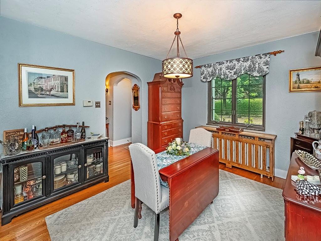 644 Beverly Road Pittsburgh, PA 15243 - Photo 6 of 26 a living room with furniture and a chandelier