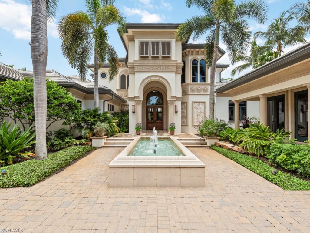 17012 Treviso Way Naples, FL 34110 - Photo 40 of 50 a view of outdoor space yard and front view of a house