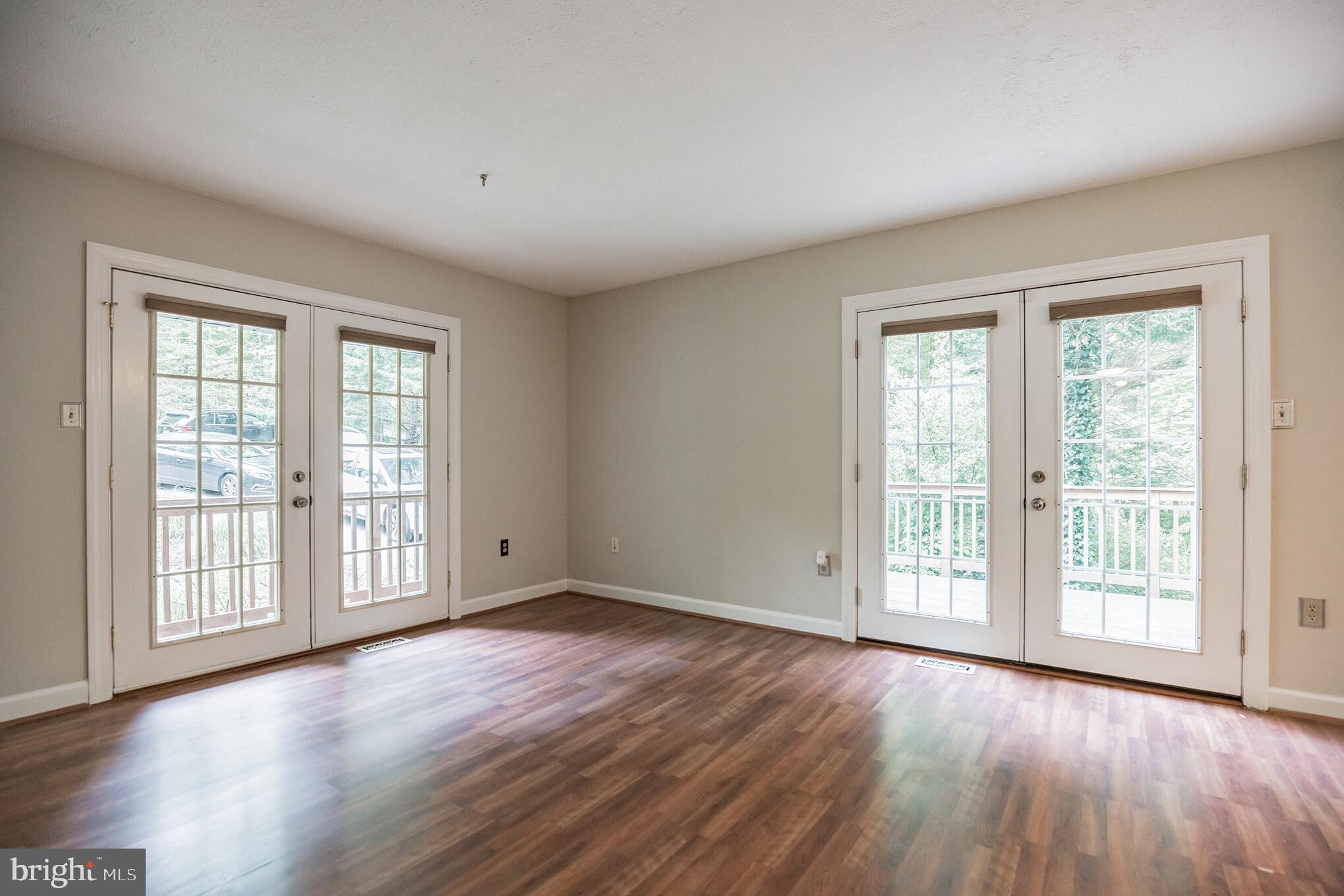 4405 Willows Road Chesapeake Beach, MD 20732 - Photo 12 of 32 Living room - French doors