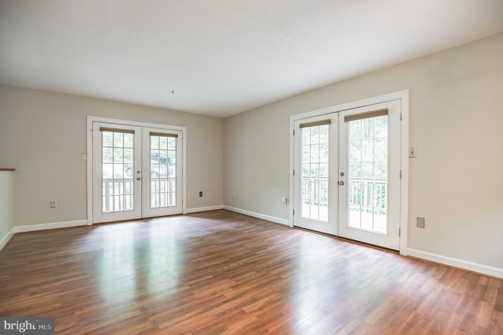 4405 Willows Road Chesapeake Beach, MD 20732 - Photo 13 of 32 Living room - French doors 2