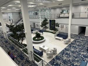 7281 Amberly Lane, Unit 308 Delray Beach, FL 33446 - Photo 12 of 20 a kitchen with a stove and a view of living room