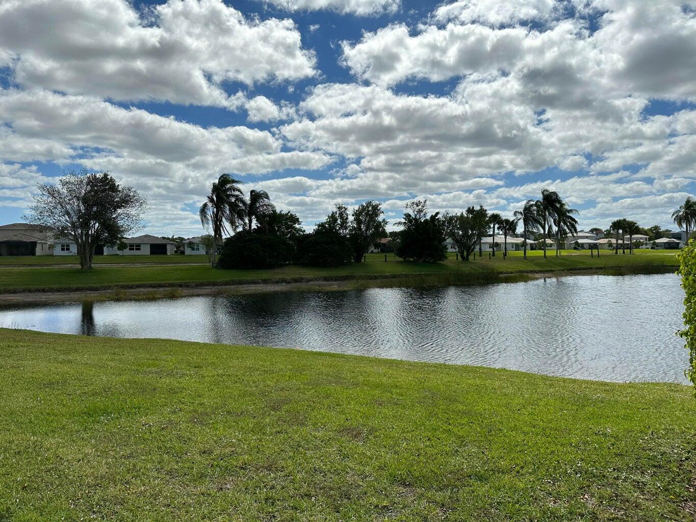7281 Amberly Lane, Unit 308 Delray Beach, FL 33446 - Photo 19 of 20 a view of a lake