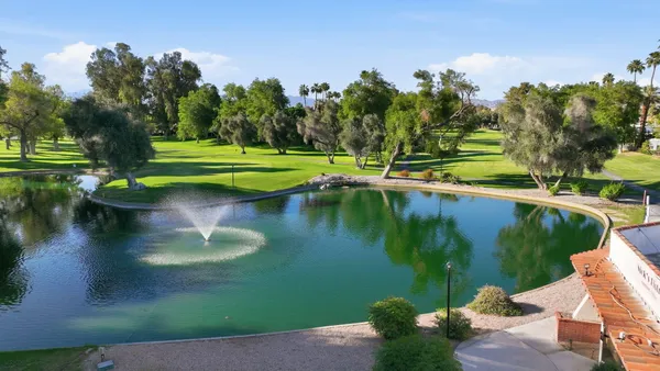 a view of a lake view with a garden