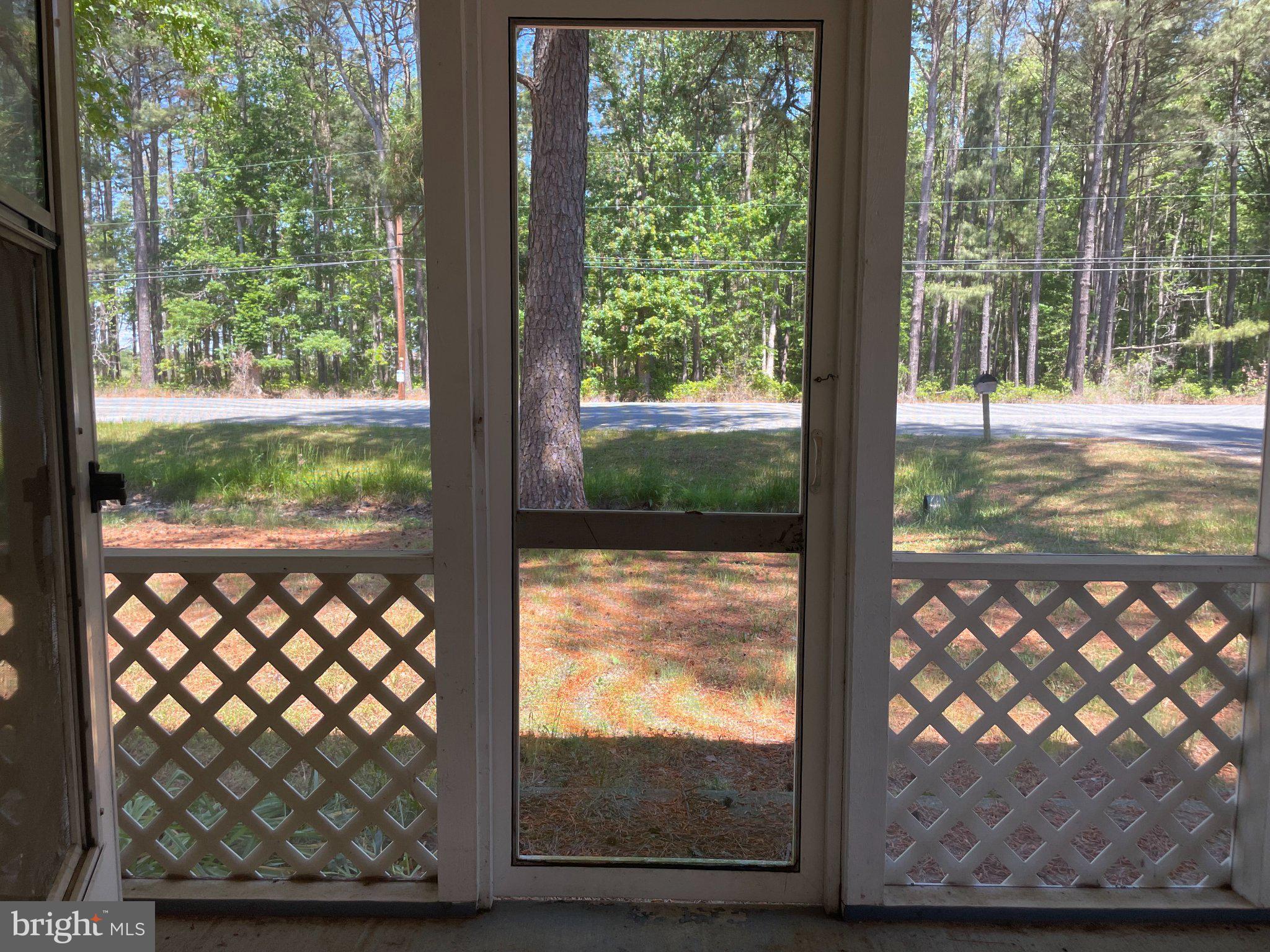 1113 Taylors Island Road Madison, MD 21648 - Photo 32 of 35 a view of backyard from a window
