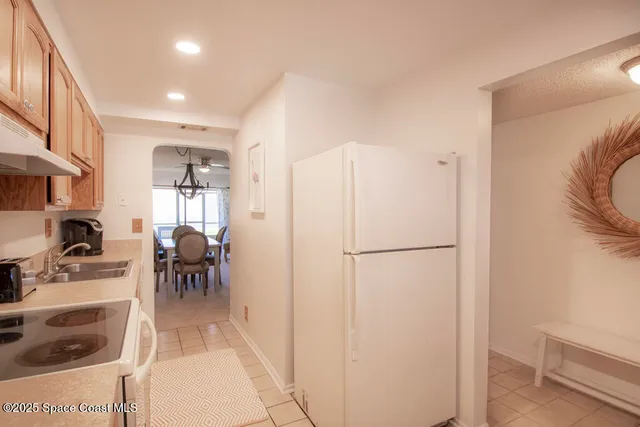 a view of living room with furniture and a window