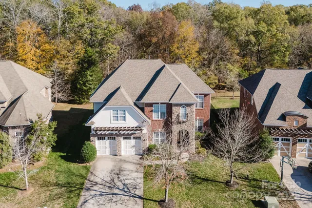 a house with trees in the background