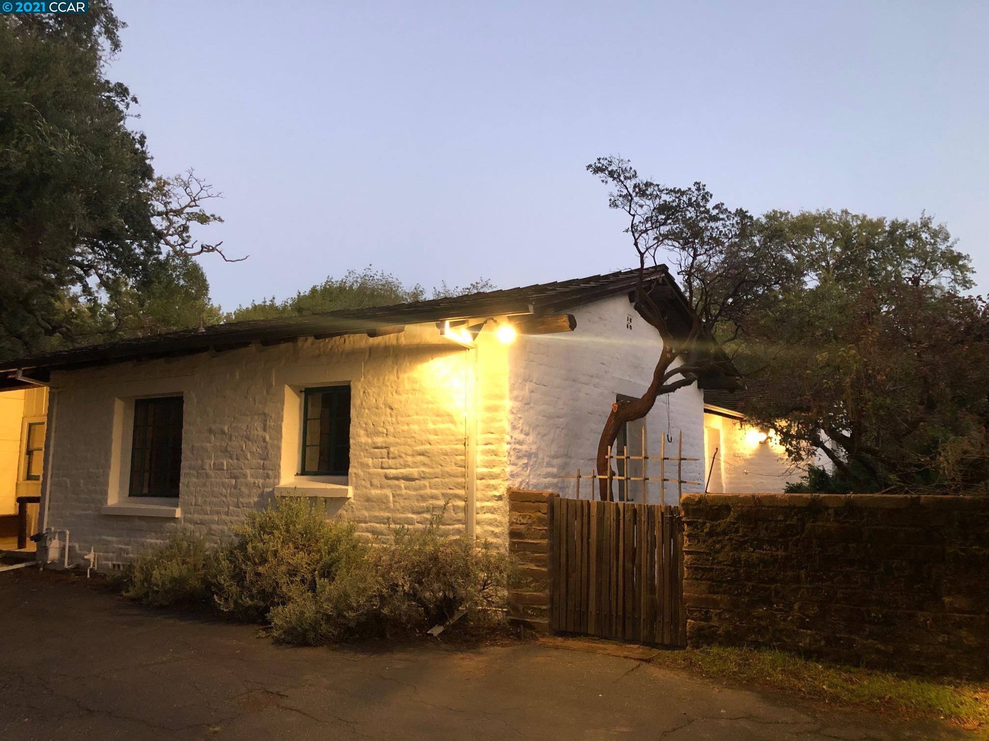 3374 Las Huertas Road Lafayette, CA 94549 - Photo 1 of 1 a view of a house with a backyard