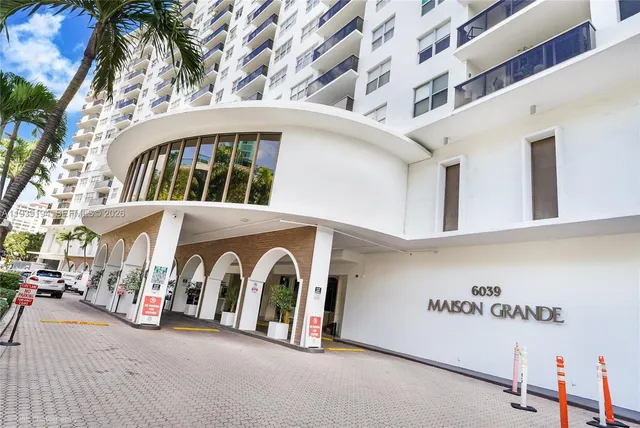 a view of a car park side of building