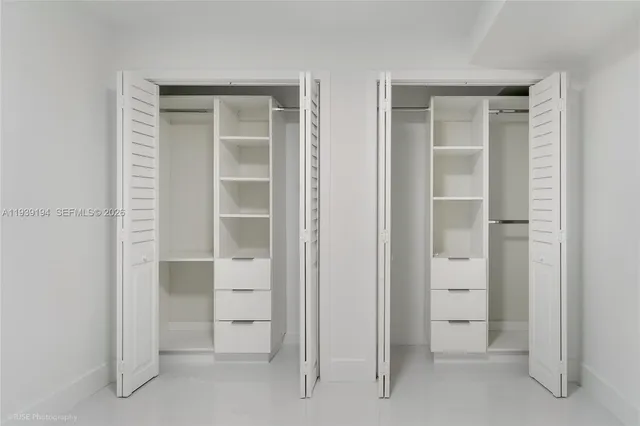 a view of an empty walk in closet