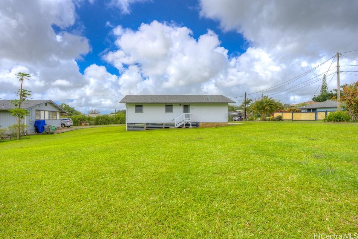 6363 A Puupilo Road Kapaa, HI 96746 - Photo 16 of 19 a view of a house with a big yard and a large tree