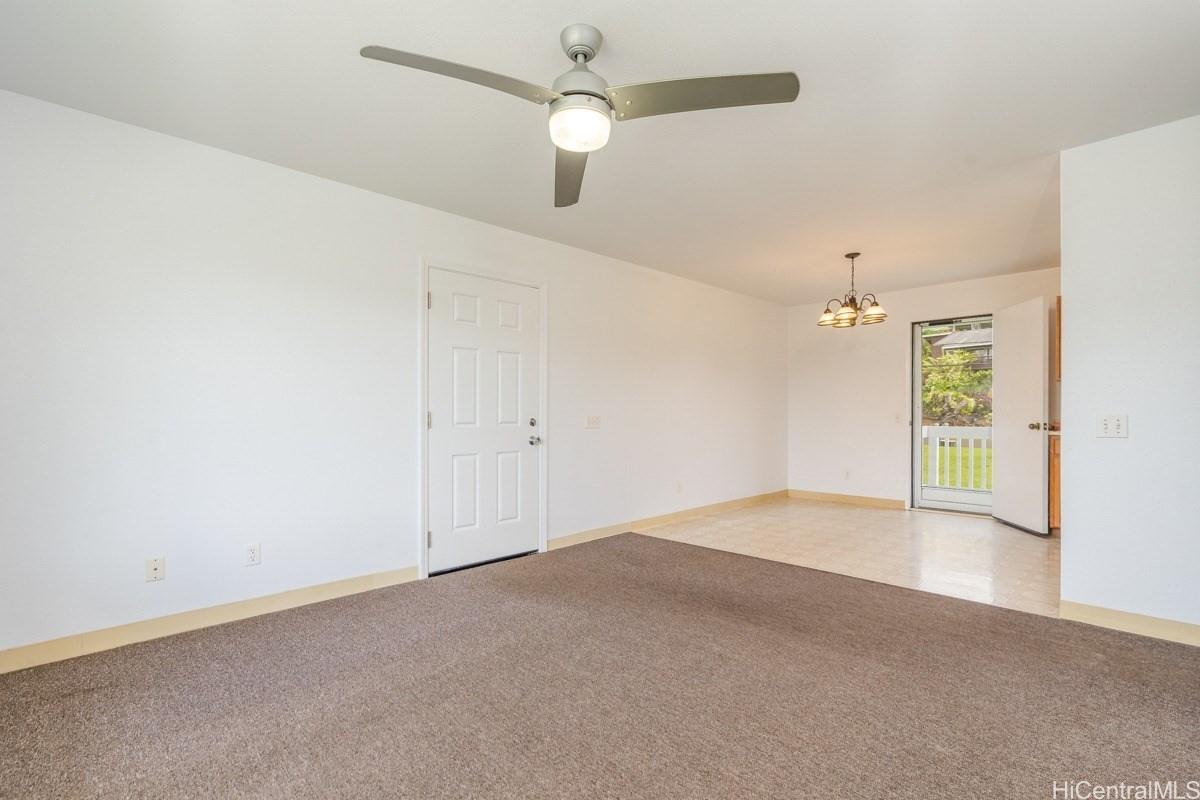 6363 A Puupilo Road Kapaa, HI 96746 - Photo 9 of 19 an empty room with fan and windows