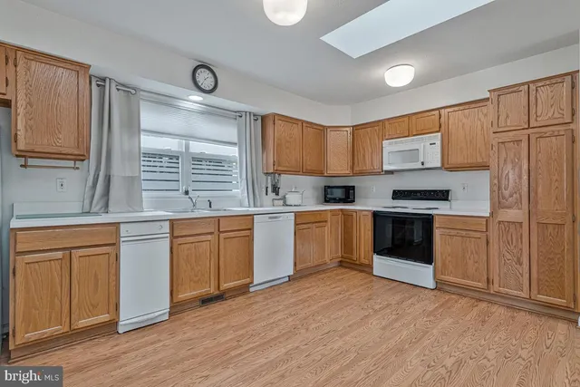 a view of a swimming pool with an outdoor seating