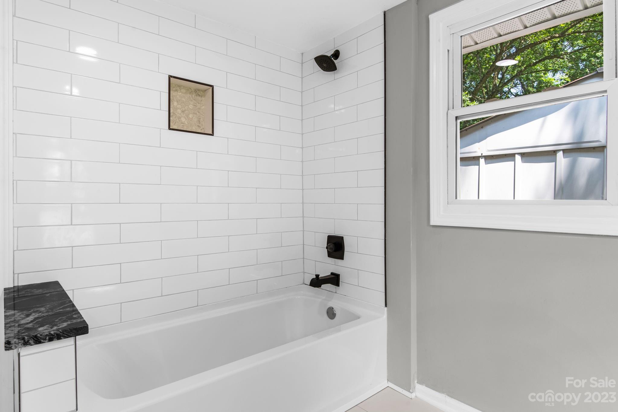 60 Hunter Bridge Road Stony Point, NC 28678 - Photo 16 of 43 a bathroom with a bathtub