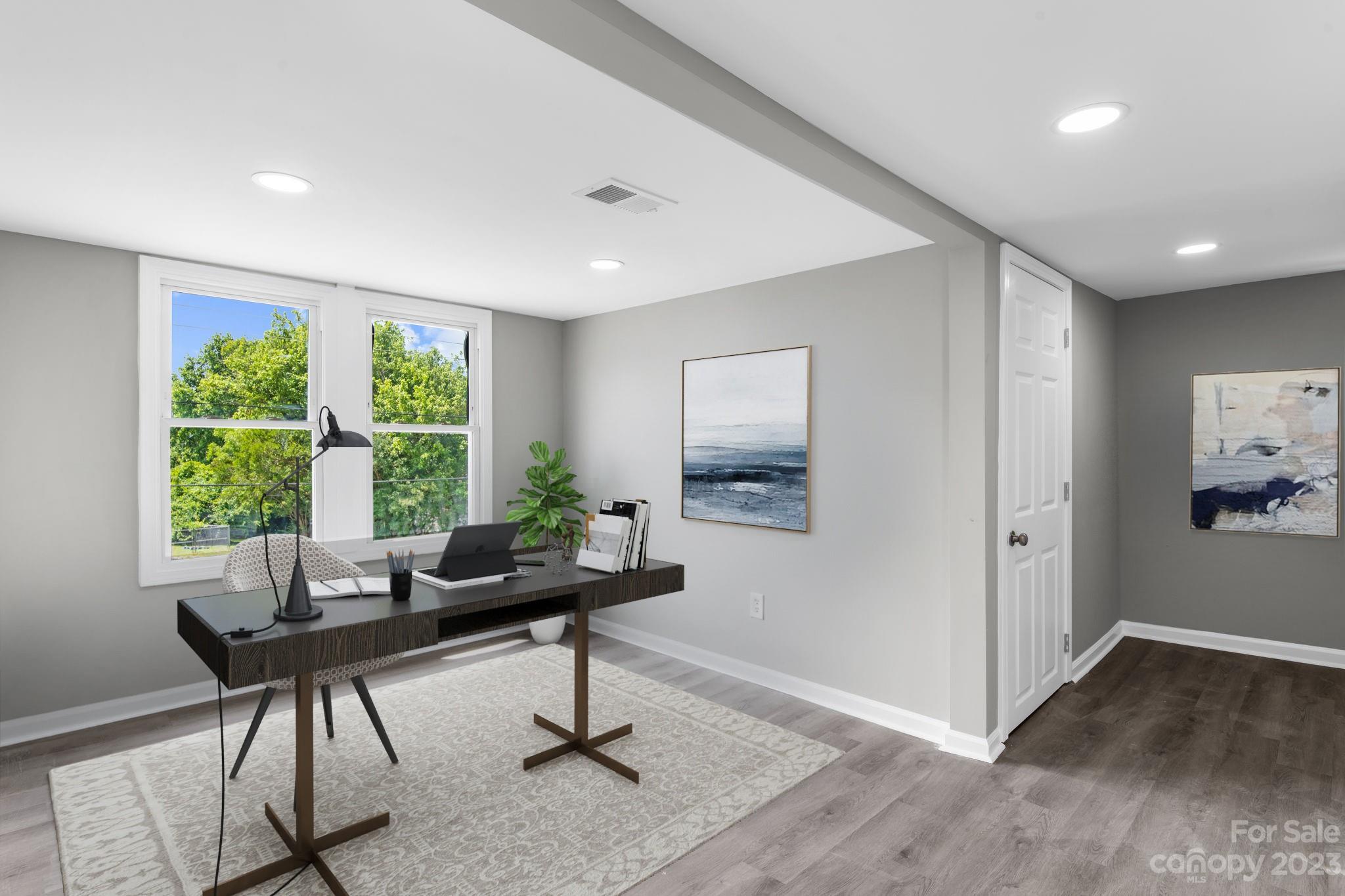 60 Hunter Bridge Road Stony Point, NC 28678 - Photo 19 of 43 a living room with furniture and a window