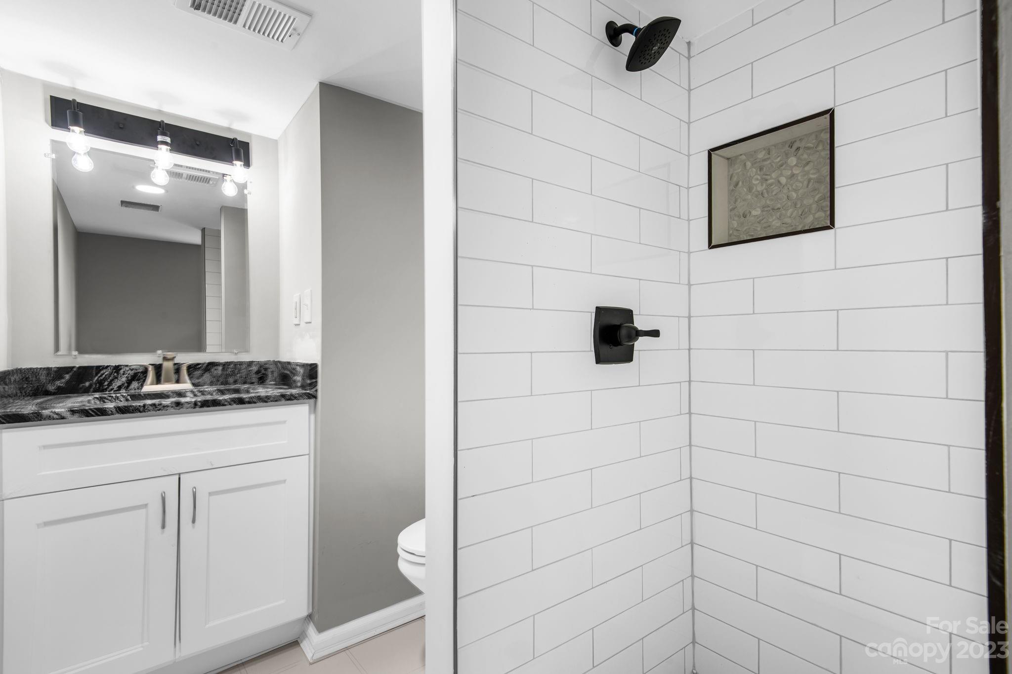 60 Hunter Bridge Road Stony Point, NC 28678 - Photo 21 of 43 a bathroom with a shower