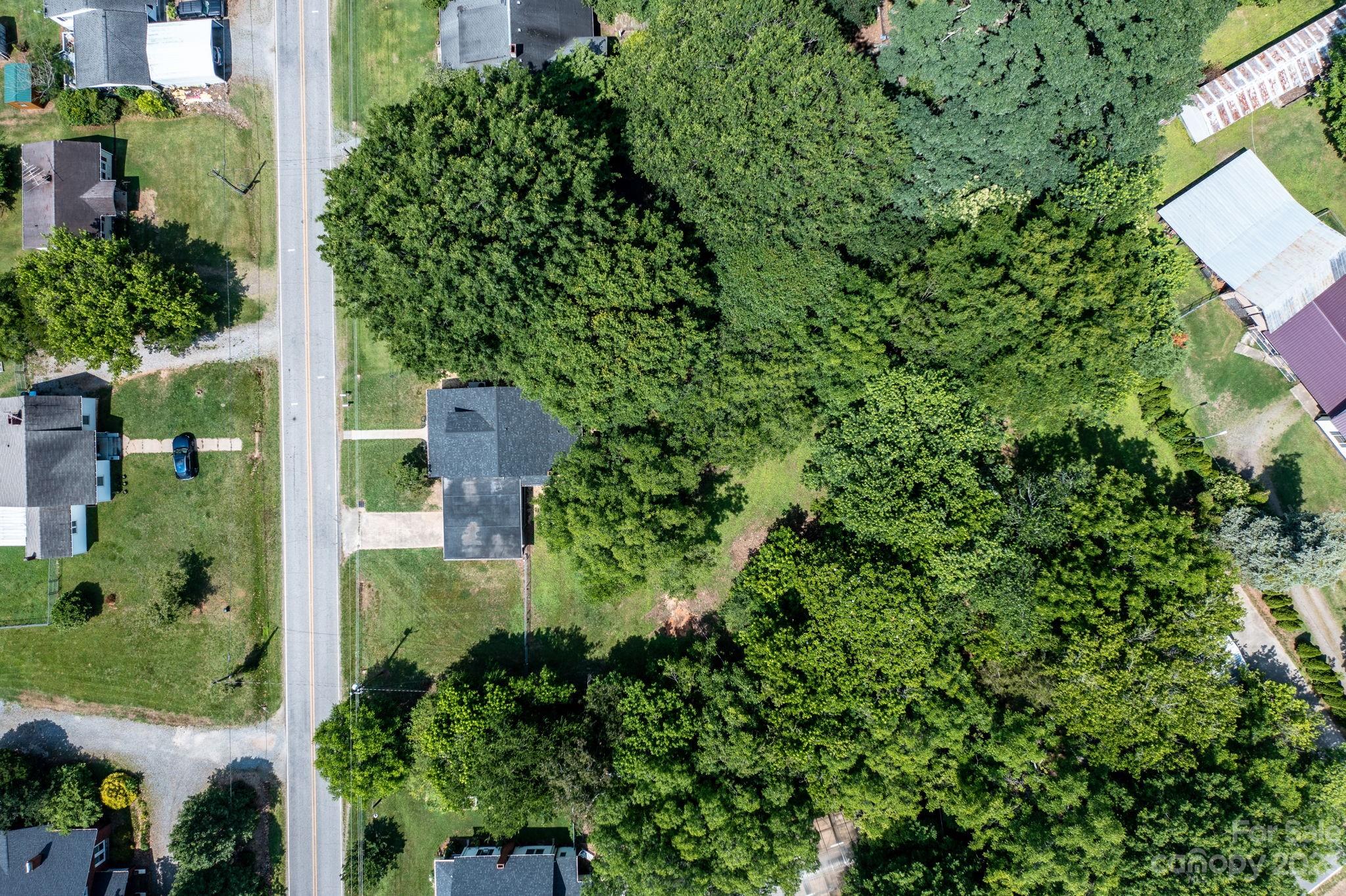60 Hunter Bridge Road Stony Point, NC 28678 - Photo 26 of 43 an aerial view of a house with a yard and outdoor seating
