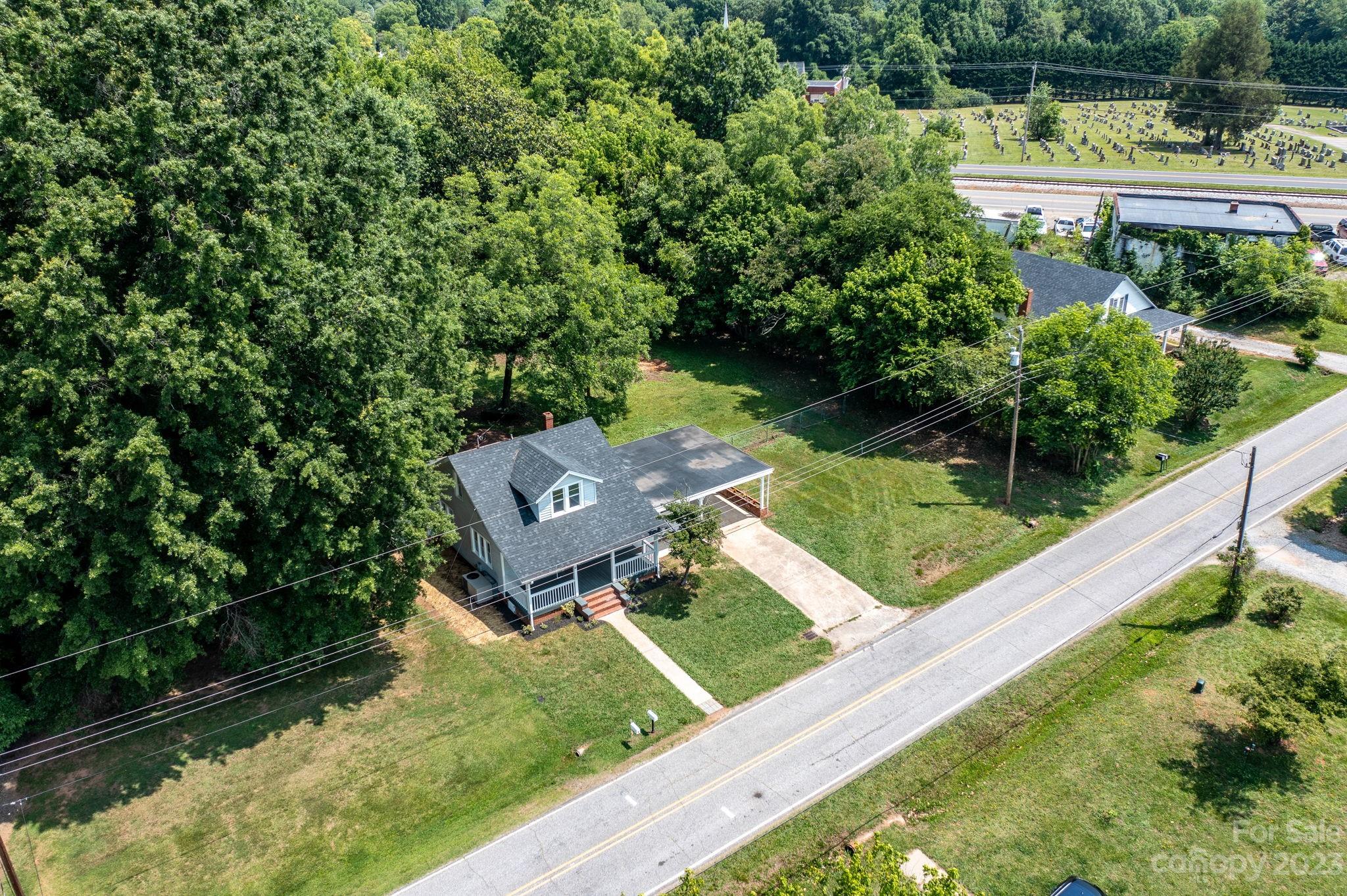 60 Hunter Bridge Road Stony Point, NC 28678 - Photo 28 of 43 a view of a garden with a lake view