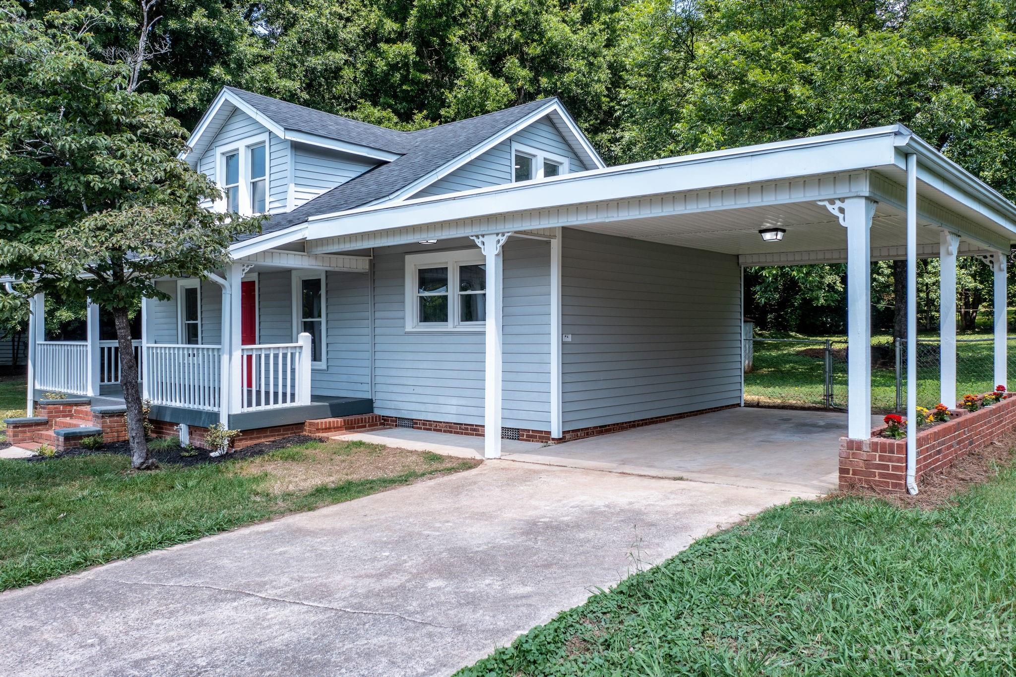 60 Hunter Bridge Road Stony Point, NC 28678 - Photo 40 of 43 front view of a house with a yard