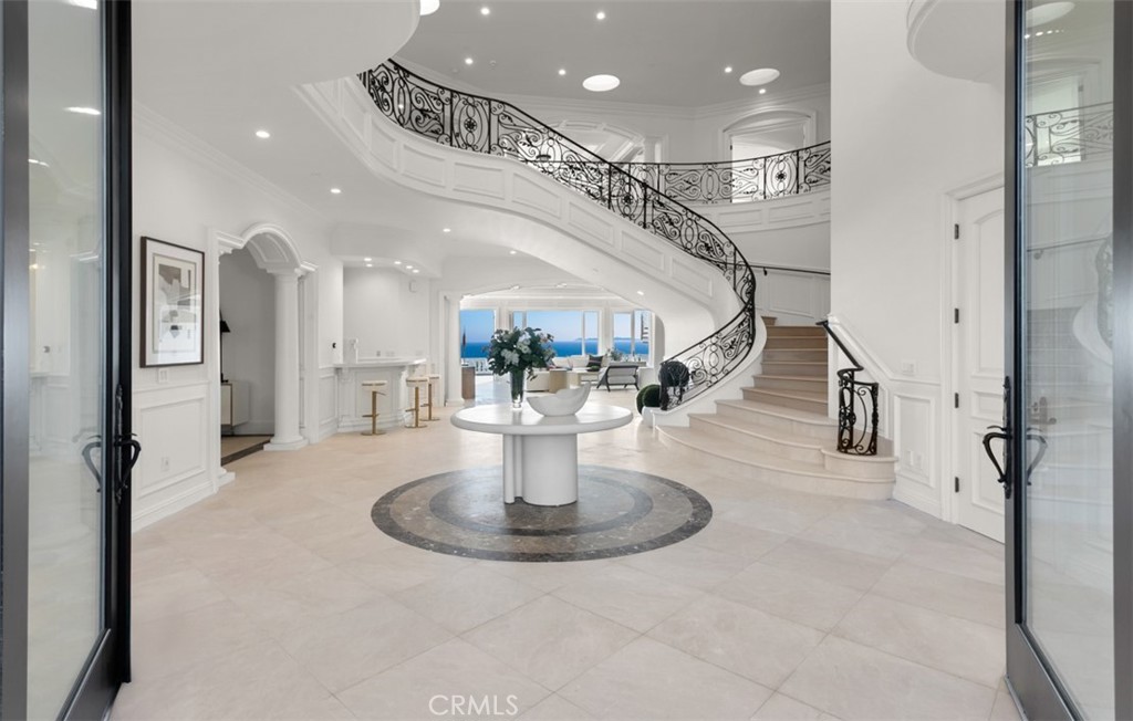 a view of entryway and hall with dining room