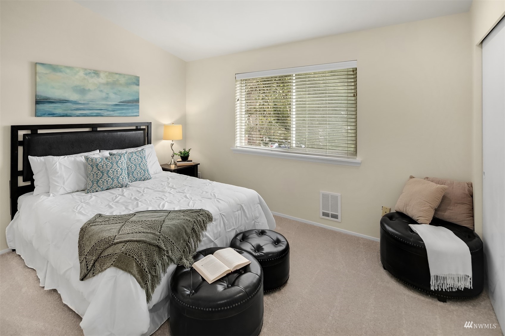 833 Southwest Sunset Boulevard, Unit G37 Renton, WA 98057 - Photo 14 of 21 a bedroom with a bed and window