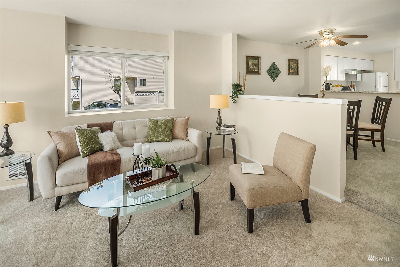 833 Southwest Sunset Boulevard, Unit G37 Renton, WA 98057 - Photo 10 of 21 a living room with furniture and a table