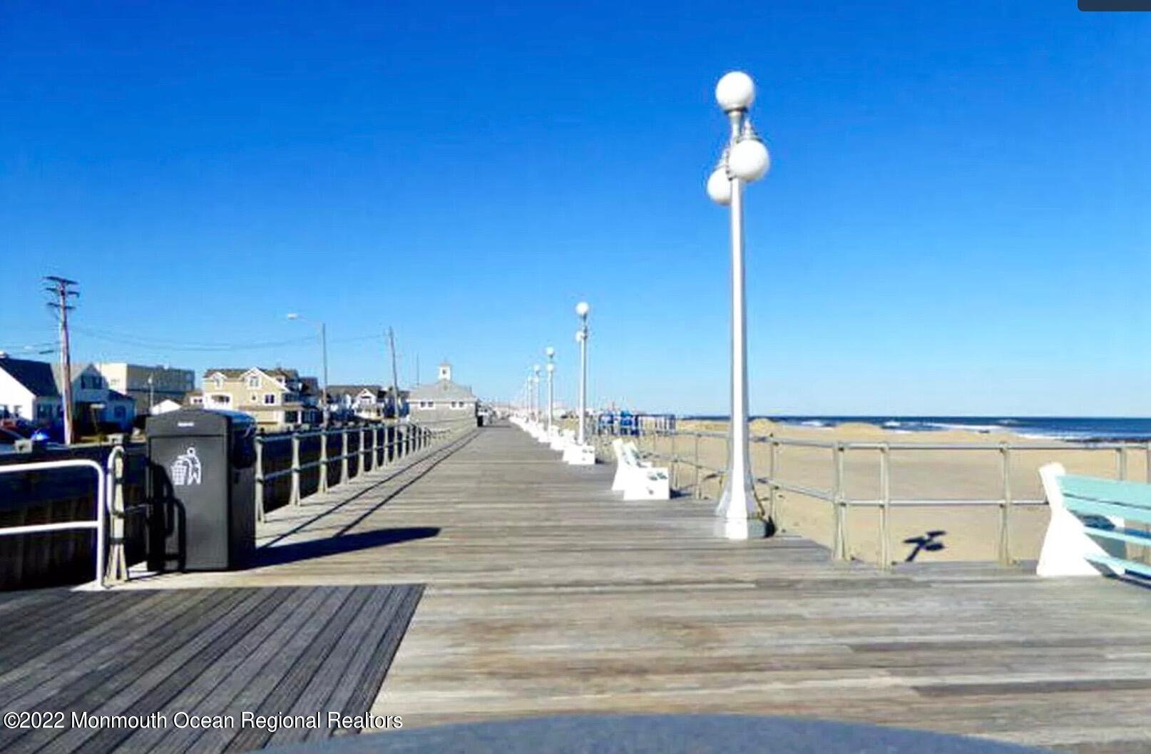 106 Lincoln Lane, Unit WINTER RENTAL Avon-by-the-Sea, NJ 07717 - Photo 11 of 11 a view of a hall way with furniture