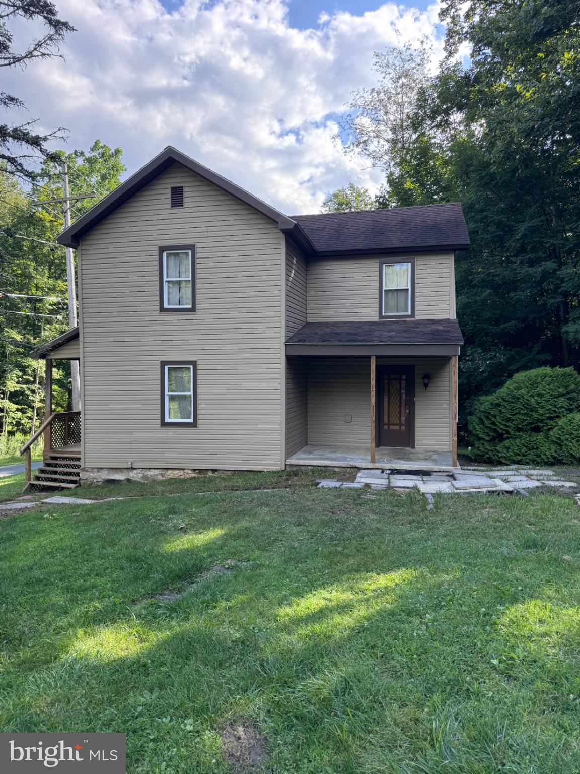 Side with covered porch