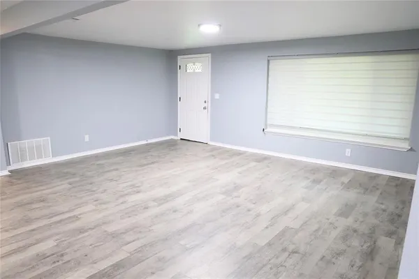 an empty room with a window