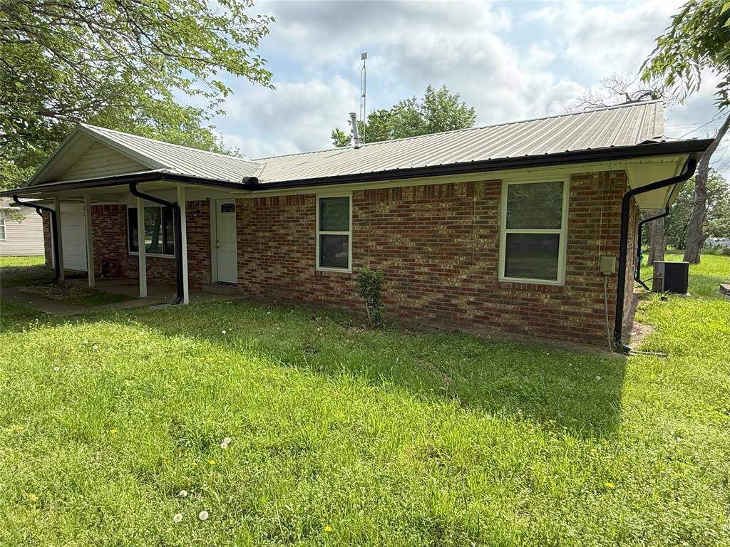 494 Lannius Road Dodd City, TX 75438 - Photo 2 of 40 a view of a house with a yard