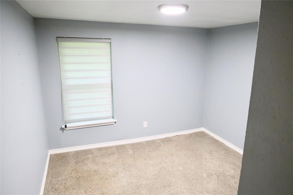 494 Lannius Road Dodd City, TX 75438 - Photo 21 of 40 an empty room with a window