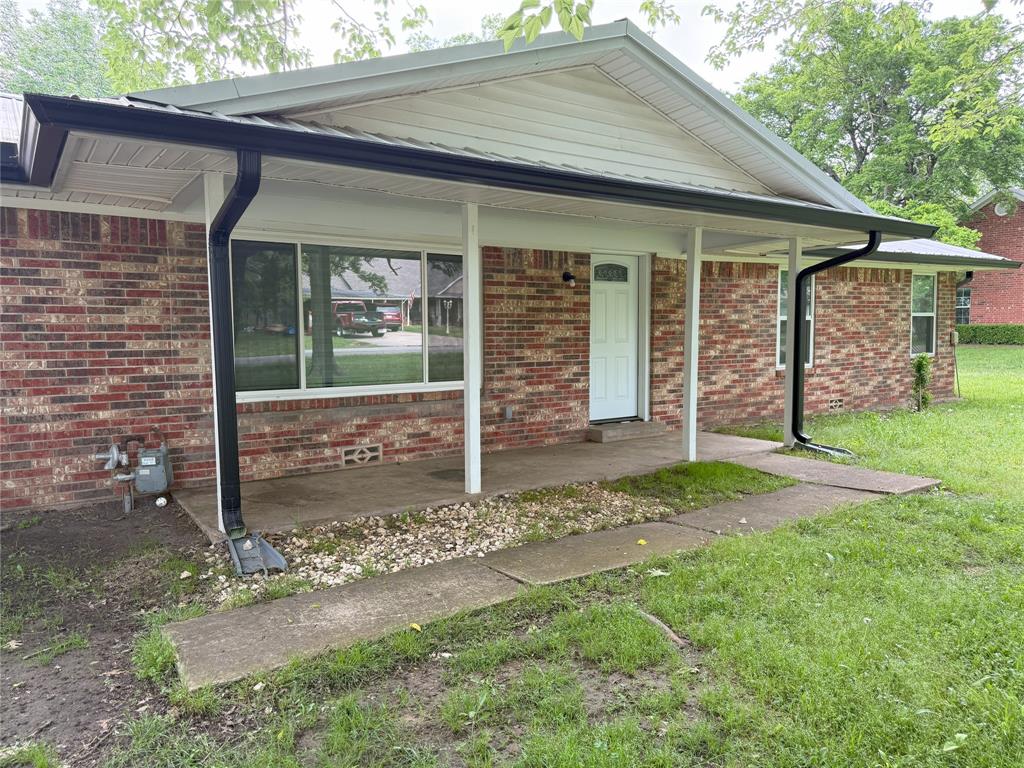 494 Lannius Road Dodd City, TX 75438 - Photo 33 of 40 a front view of a house with garden