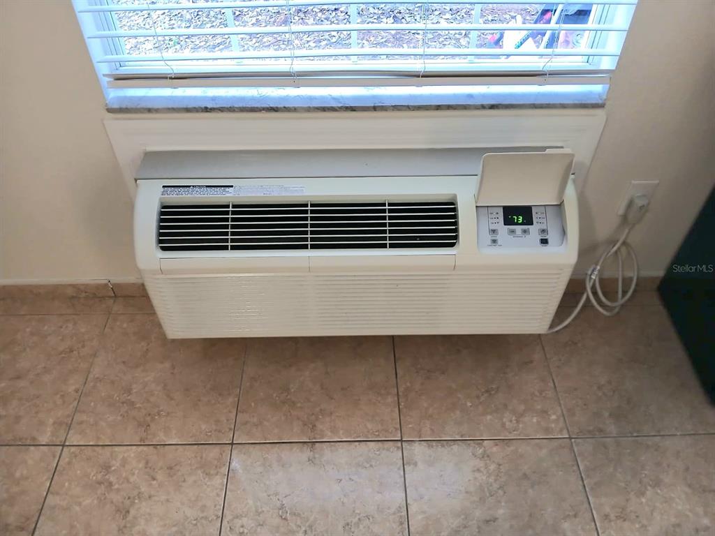 221 Caribbean Drive Davenport, FL 33897 - Photo 5 of 15 a view of kitchen and utility room