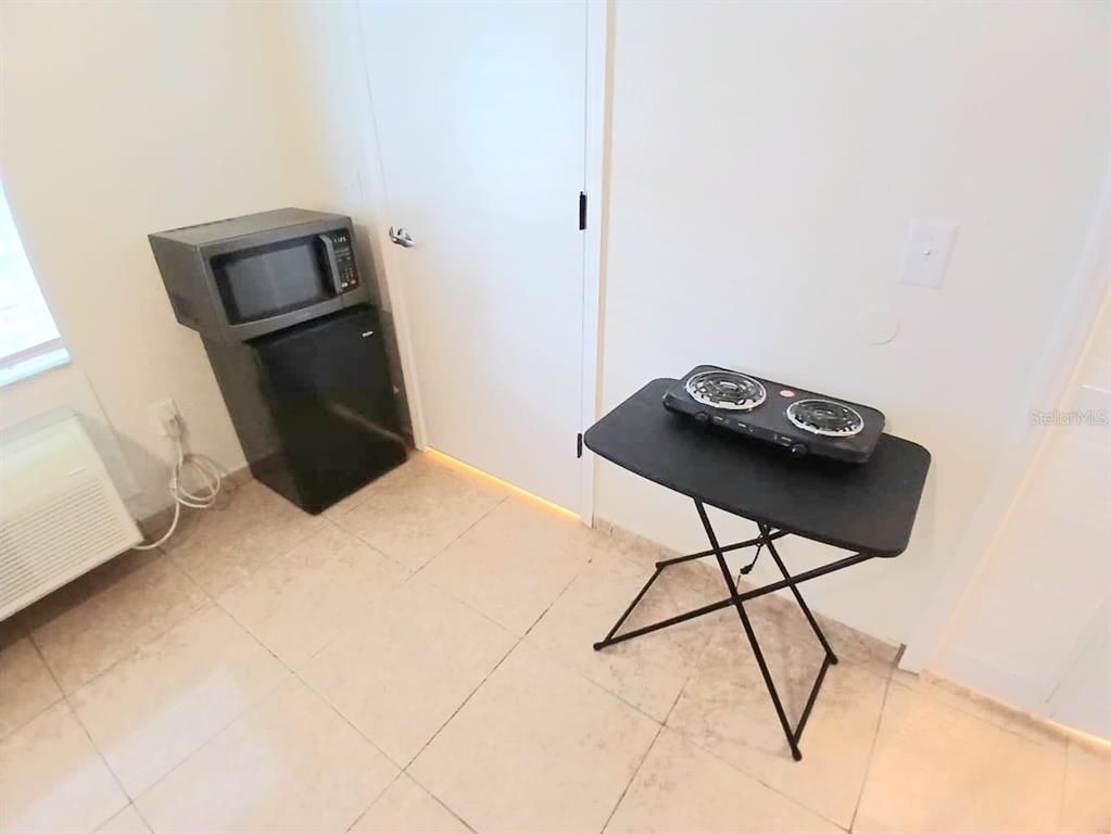 221 Caribbean Drive Davenport, FL 33897 - Photo 8 of 15 a view of workspace with furniture