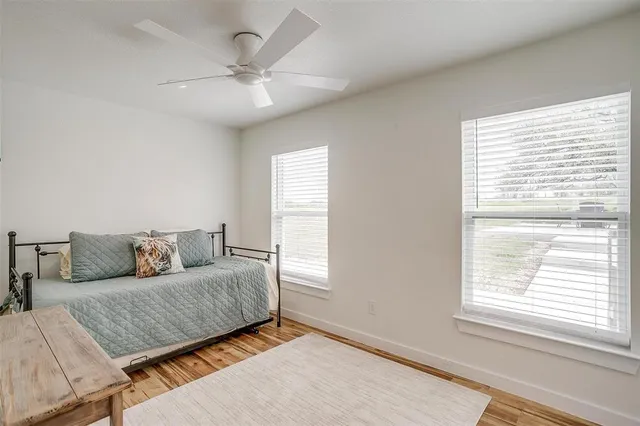 a view of a dining room with furniture and window