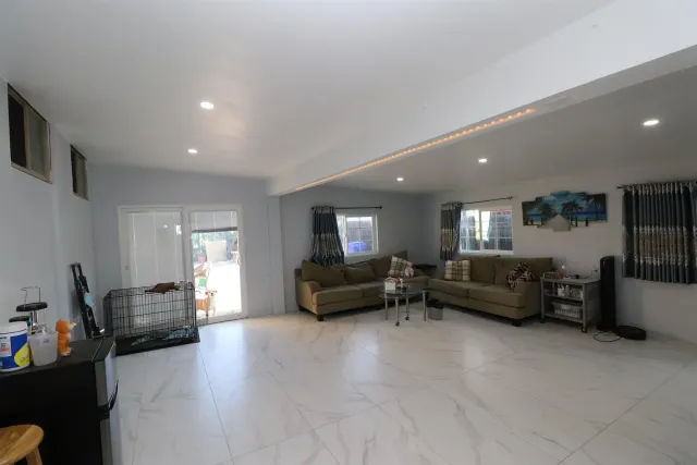 a living room with furniture and a couch