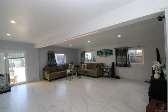 a living room with furniture and a couch