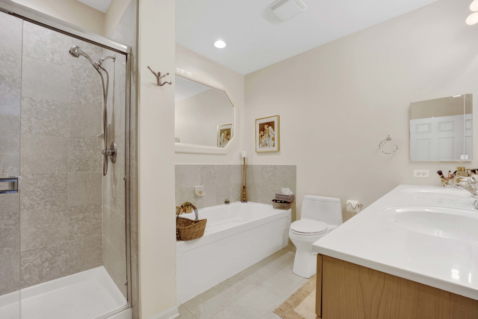 800 Weidner Road, Unit 208 Buffalo Grove, IL 60089 - Photo 12 of 19 a bathroom with a sink a toilet and shower