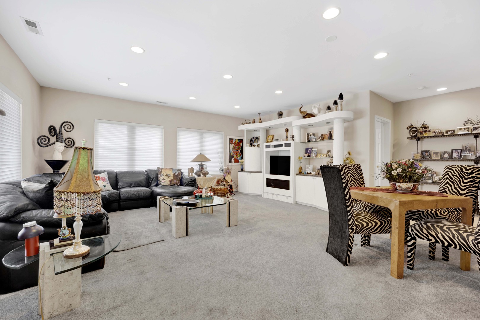 800 Weidner Road, Unit 208 Buffalo Grove, IL 60089 - Photo 3 of 19 a living room with furniture kitchen view and a table