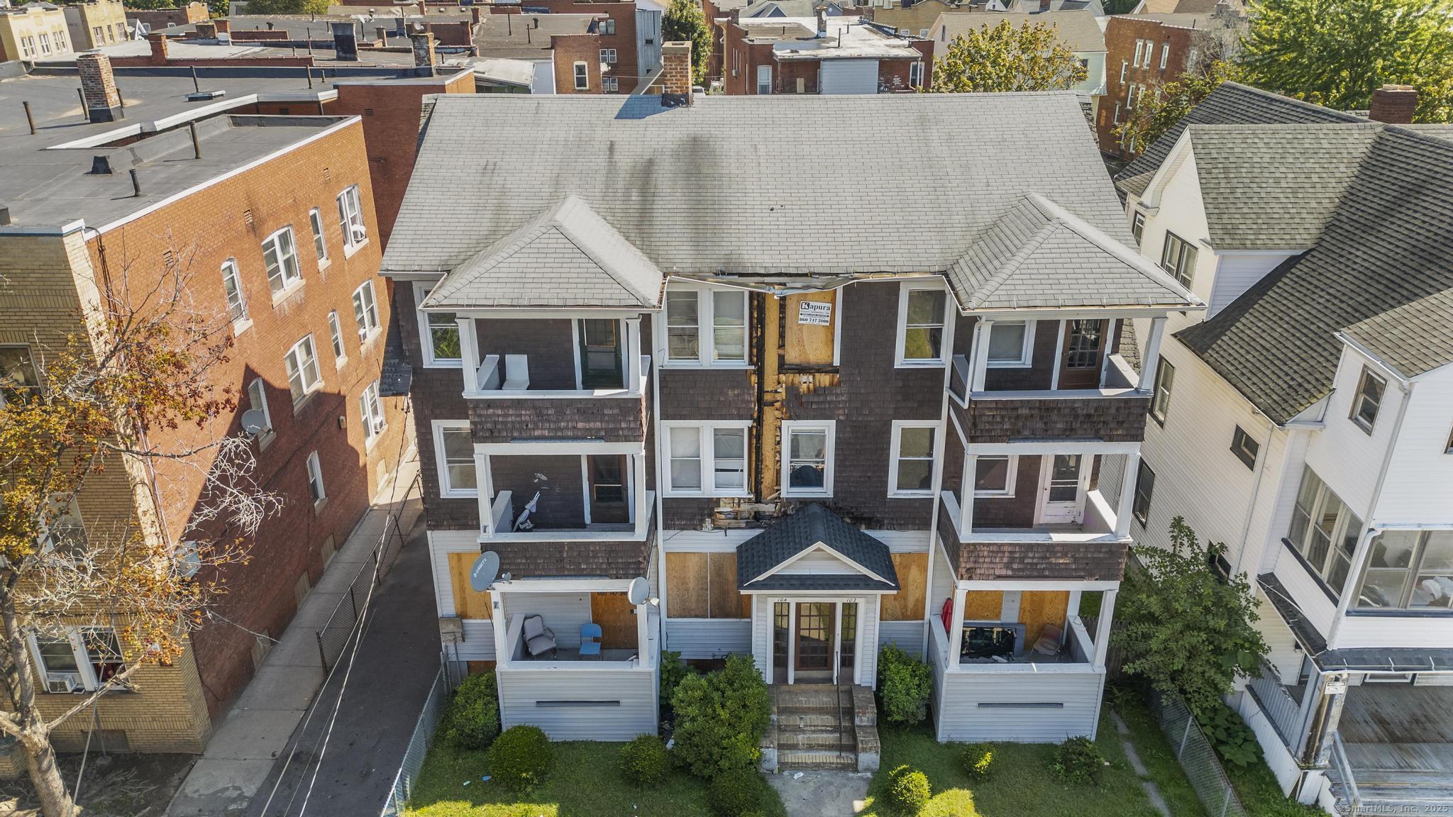 102 Rowe Avenue Hartford, CT 06106 - Photo 27 of 28 a view of multiple houses with a street