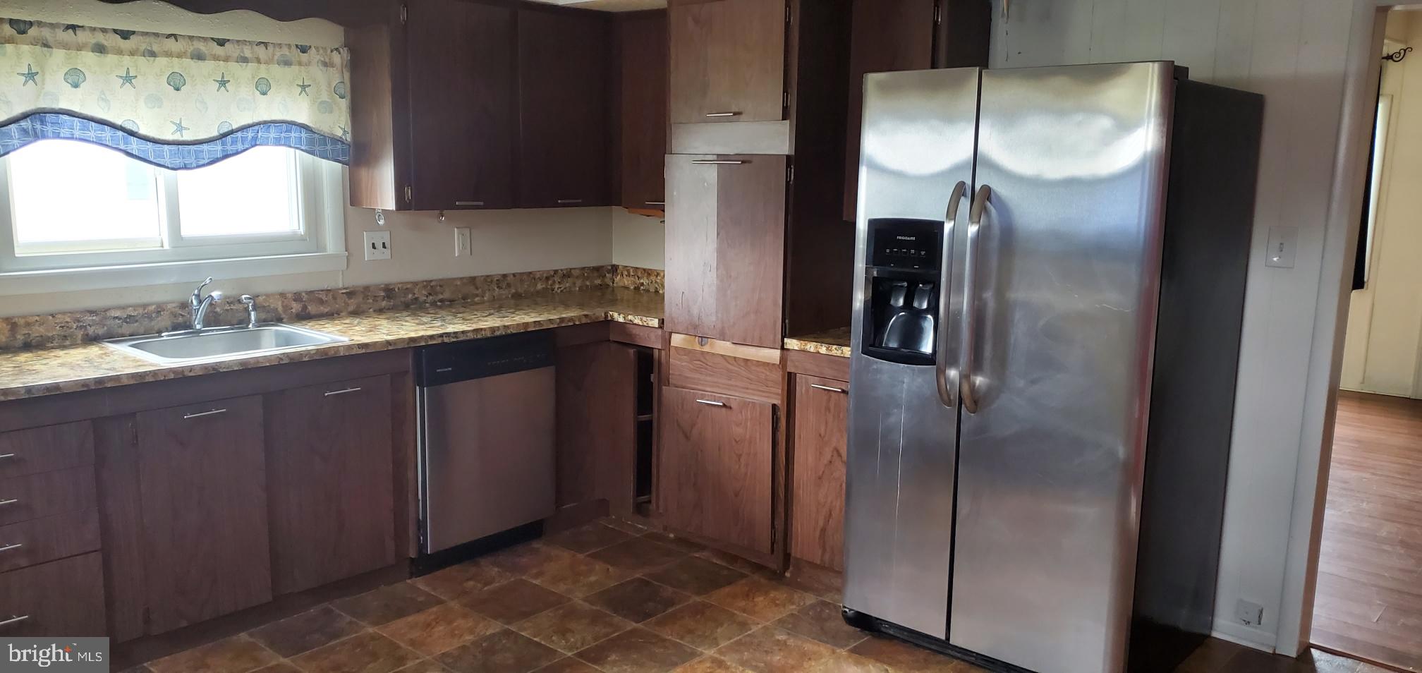 3228 Lynch Road Baltimore, MD 21219 - Photo 8 of 15 sidebyside refrigerator and plenty of cabinets