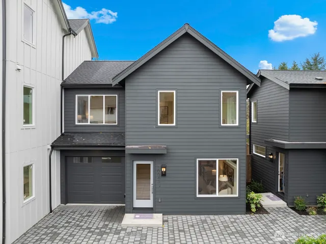 a view of livingroom with hardwood floor and a bathroom