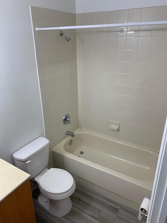 2663 Southwest 82nd Avenue, Unit 104 Miramar, FL 33025 - Photo 15 of 28 a bathroom with a toilet and a bathtub