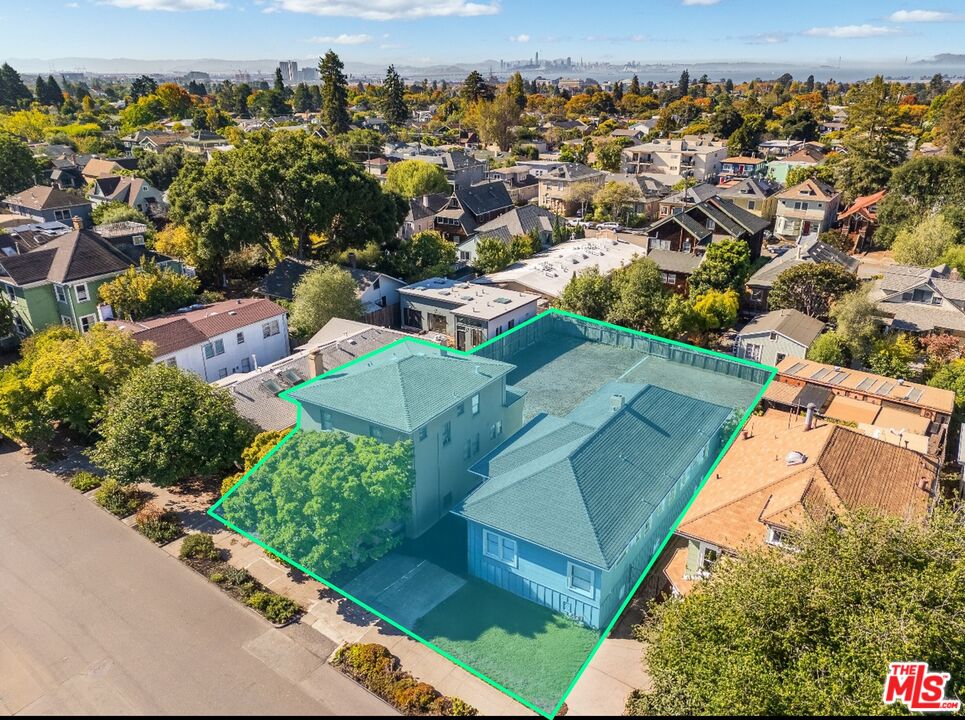 2218-2222 Grant Street Berkeley, CA 94703 - Photo 3 of 8 an aerial view of residential houses with outdoor space