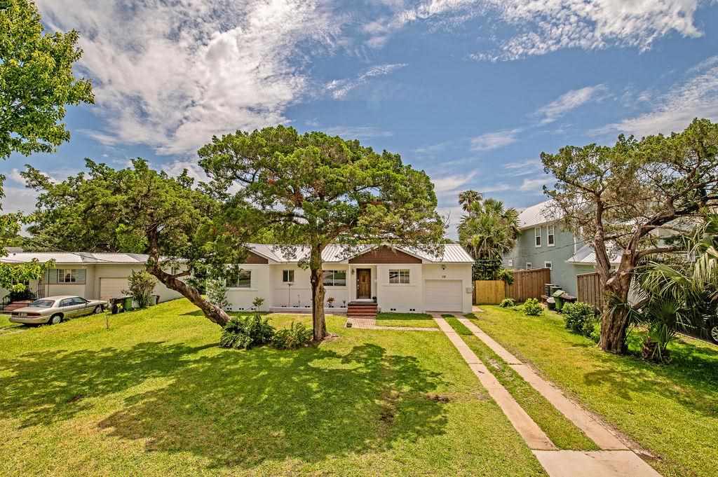 118 Menendez Road St. Augustine, FL 32080 - Photo 2 of 31 a view of yard with swimming pool and trees
