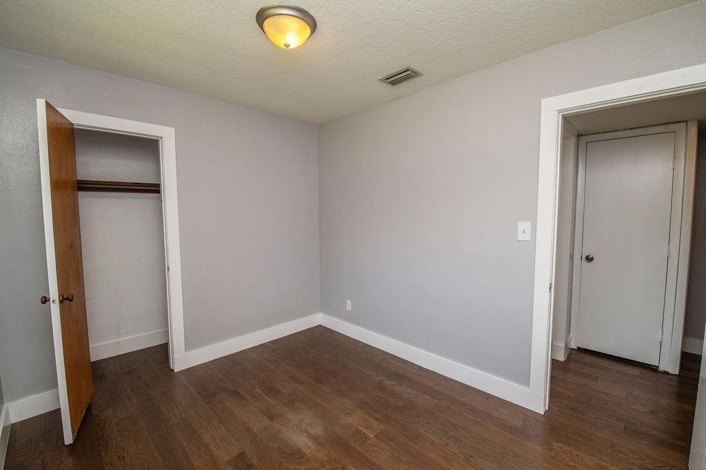 118 Menendez Road St. Augustine, FL 32080 - Photo 17 of 31 wooden floor in an empty room