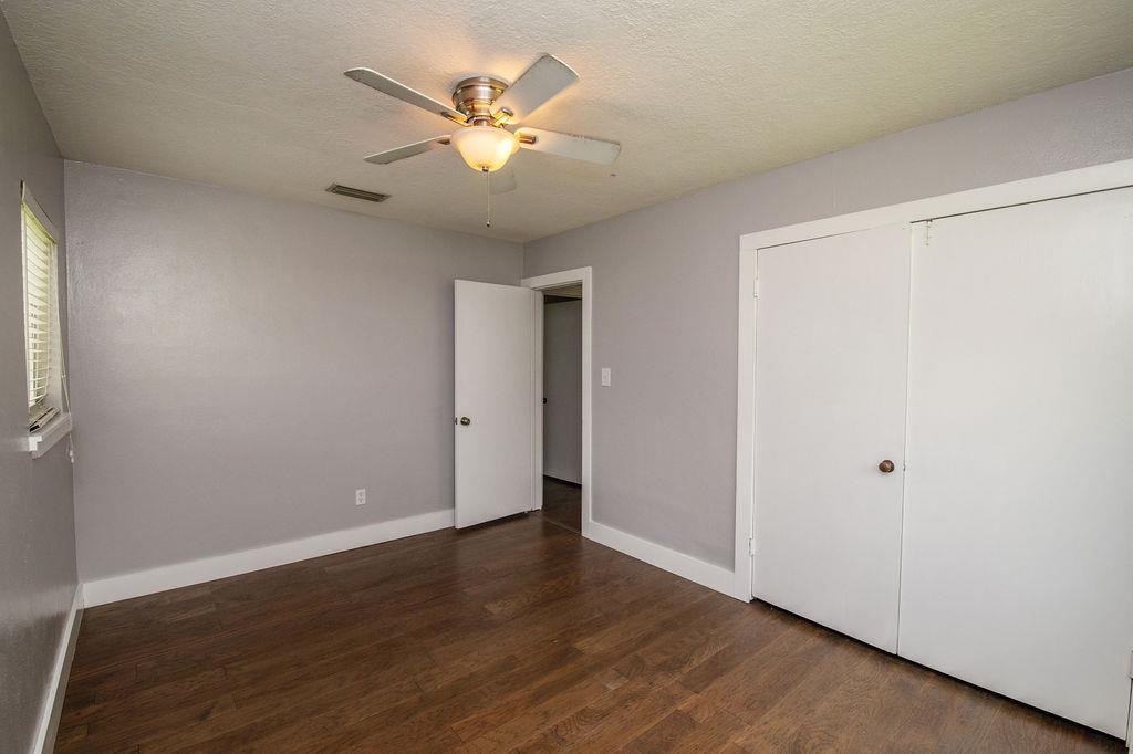 118 Menendez Road St. Augustine, FL 32080 - Photo 19 of 31 a view of an empty room with wooden floor