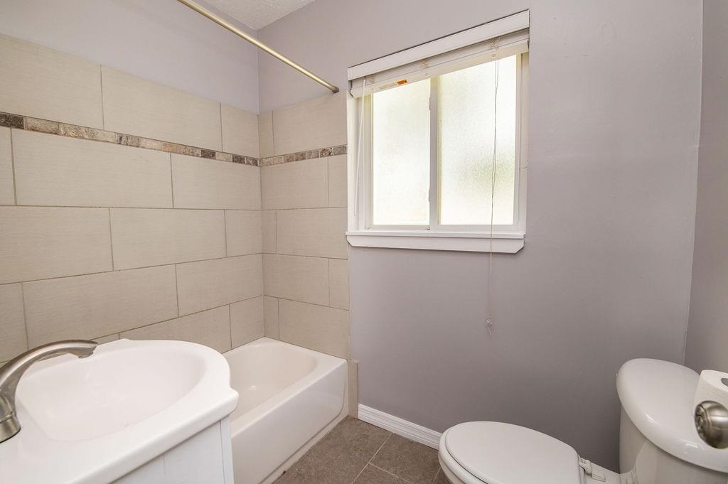 118 Menendez Road St. Augustine, FL 32080 - Photo 20 of 31 a bathroom with a sink a toilet and shower