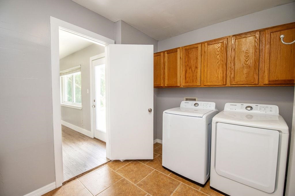 118 Menendez Road St. Augustine, FL 32080 - Photo 10 of 31 a view of storage and utility room with washer and dryer