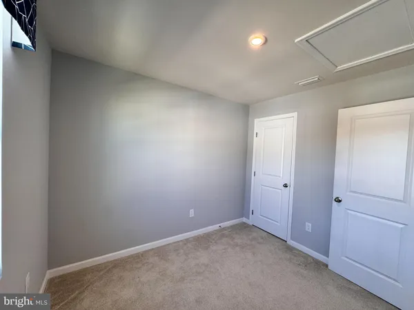 a view of a room with an empty space